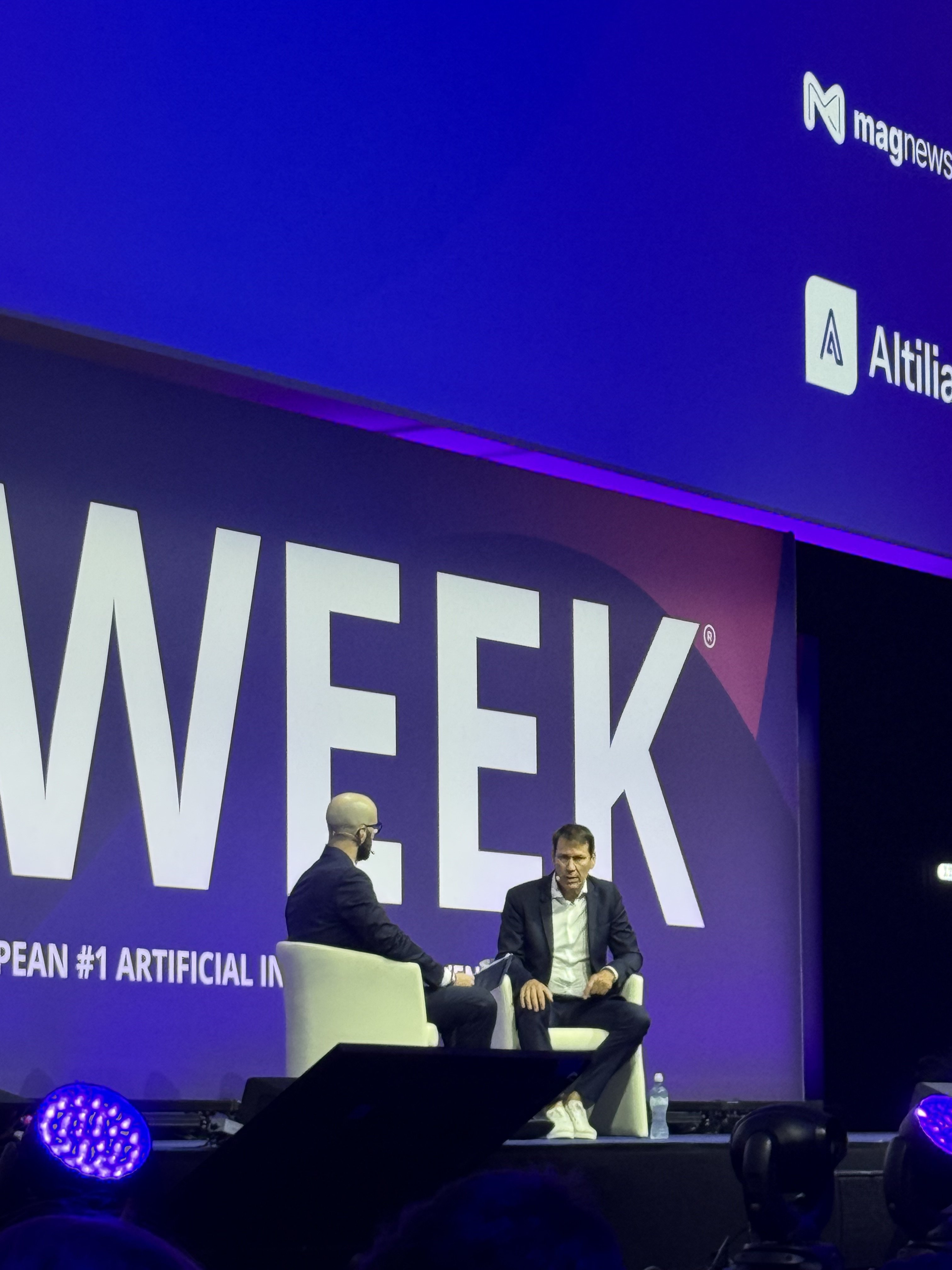 A fireside session on the AI Week stage in Milan