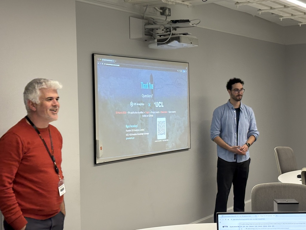 Ilgaz Incedayi (GIS Analytics) and Prof. Antonis Bikakis (UCL) presenting the Knowledge Exchange project to students at UCL, March 2026